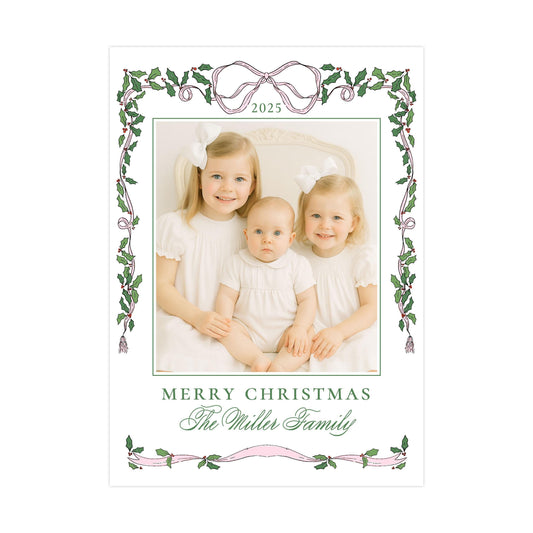 A family portrait of three young girls in white dresses, with a decorative border and a "Merry Christmas" greeting at the bottom.