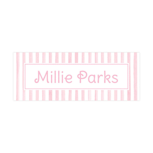 a pink and white striped banner with the text &quot;Millie Parks&quot; written on it.