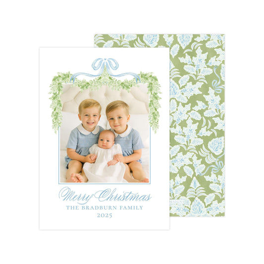 A family photo of two young boys and a baby, with a decorative border and text that reads &quot;Merry Christmas THE BRADBURN FAMILY 2015&quot;.