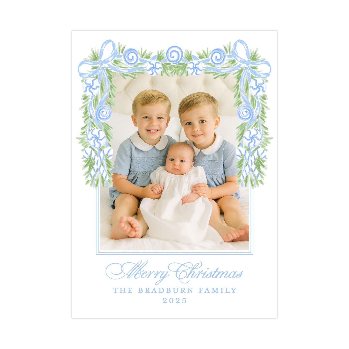 A family portrait of two young boys and a baby, with a decorative border and text at the bottom.