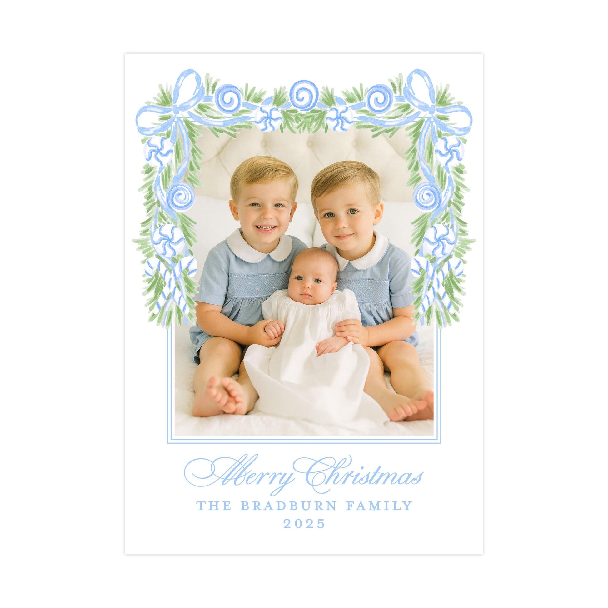 A family portrait of two young boys and a baby, with a decorative border and text at the bottom.