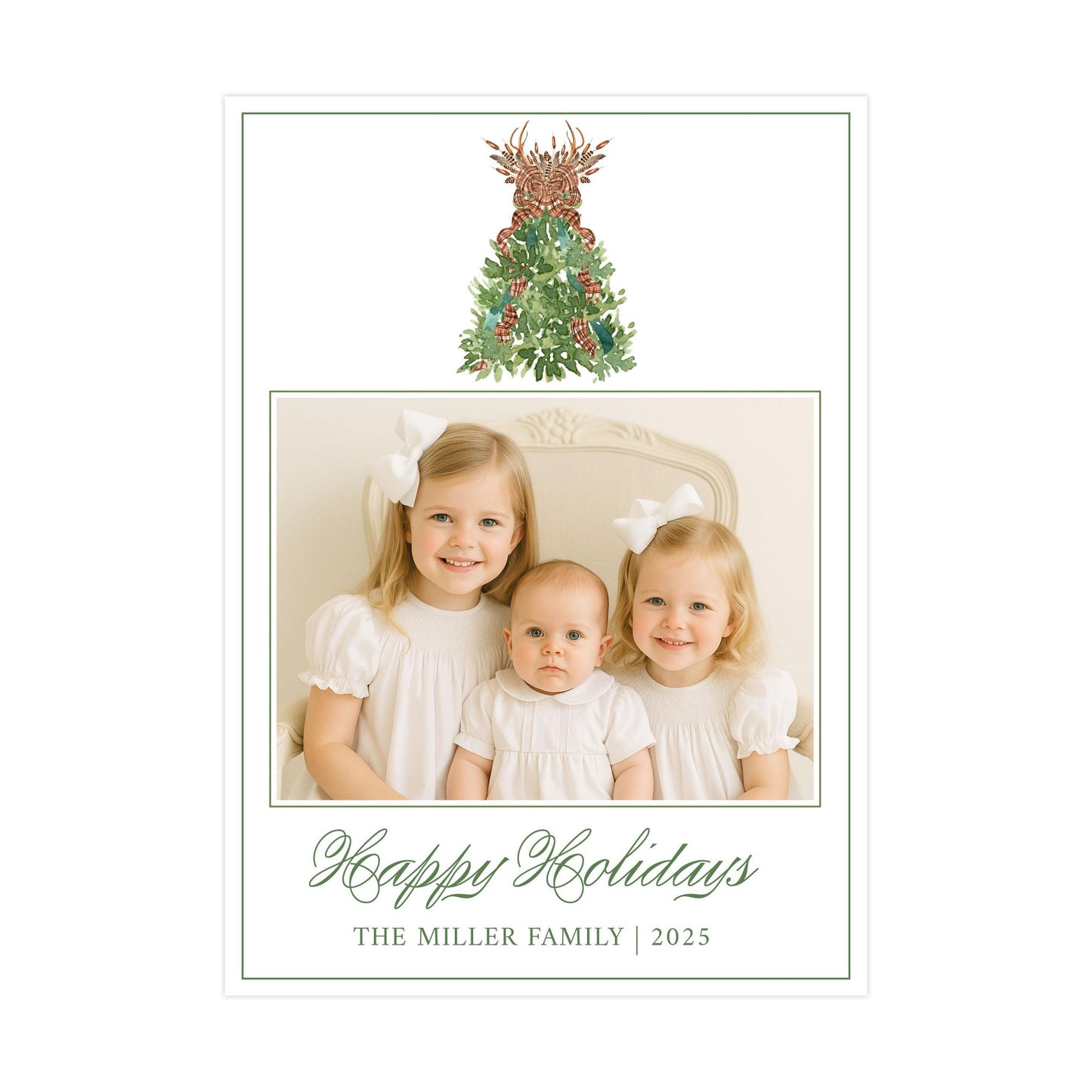 A family portrait of three young girls in white dresses, with a Christmas tree and reindeer decoration in the background. The text below the image reads &quot;Happy Holidays The Miller Family 2025&quot;.