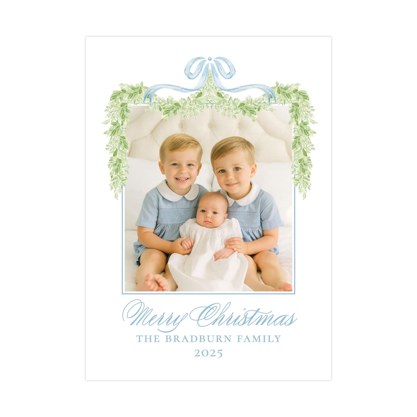 A family portrait of two young boys and a baby, with a decorative border and text at the bottom.
