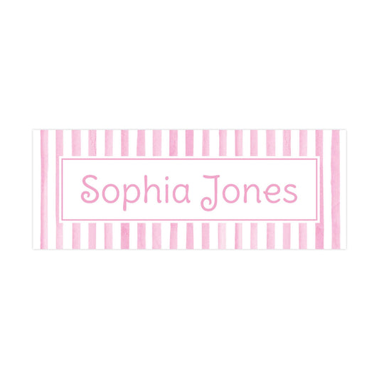 A pink and white striped banner with the name &quot;Sophia Jones&quot; written in cursive.