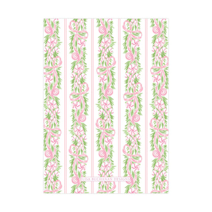 a repeating pattern of pink and green floral designs on vertical stripes.