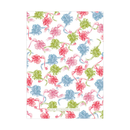 a repeating pattern of pink, blue, and green flowers on a white background.