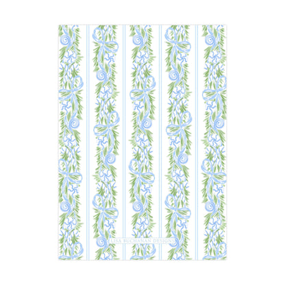 a repeating pattern of blue and green floral designs on vertical stripes.