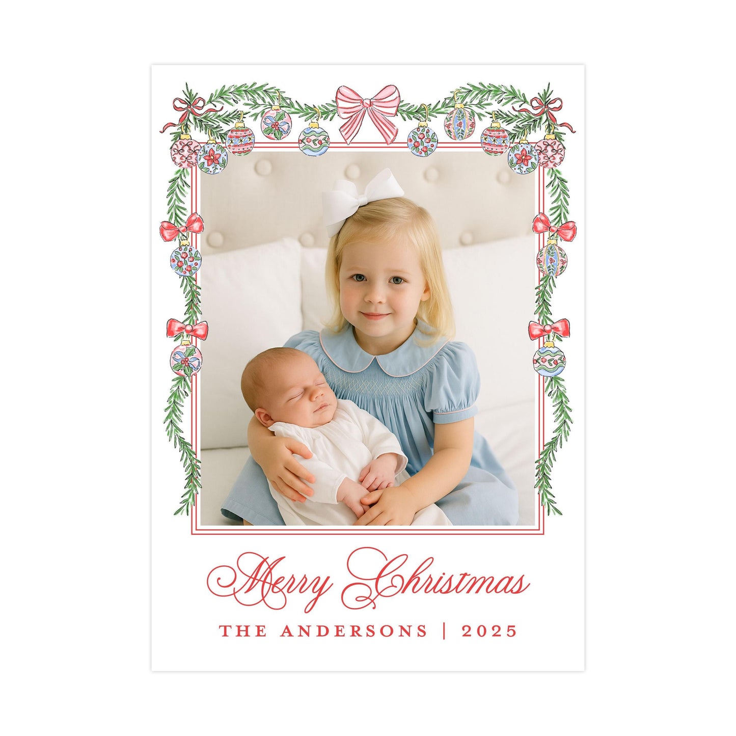 A young girl in a blue dress is holding a sleeping baby in her arms, with a festive Christmas-themed frame surrounding them. The text &quot;Merry Christmas&quot; and &quot;THE ANDERSons | 2025&quot; is visible, indicating the holiday season and the name of the family.