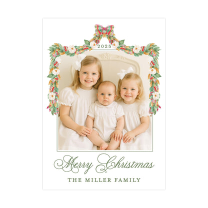 A family portrait of three young girls in white dresses, with a floral border and the text &quot;Merry Christmas&quot; and &quot;The Miller Family&quot; at the bottom.