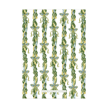 a repeating pattern of green leaves and yellow ribbons arranged in a vertical line.