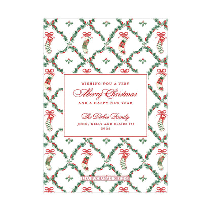 The image is a Christmas card with a festive pattern of red and green ribbons, stockings, and holly leaves. The card has a message wishing someone a very Merry Christmas and a happy new year, along with the names of the family members, John, Kelly, and Claire.
