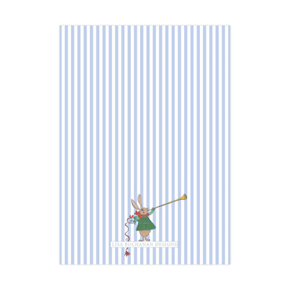 a cartoon rabbit holding a trumpet, with the text "LISA BUCKMAN DESIGNS" below the rabbit.