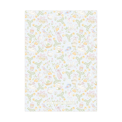 The image is a light blue background with a repeating pattern of various objects, including birds, flowers, and other decorative elements.