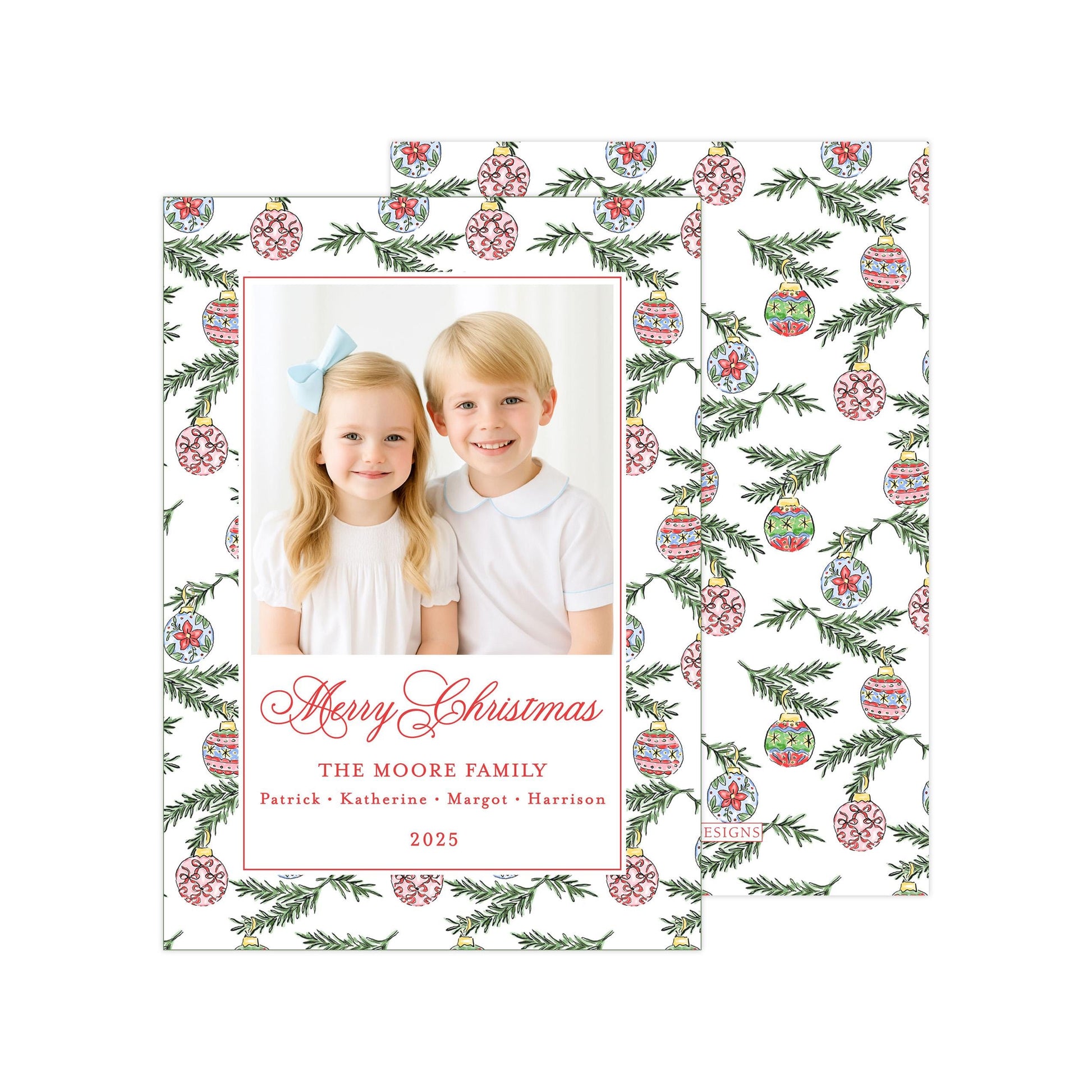 A Christmas card featuring two children, a girl and a boy, smiling and posing together in front of a patterned background with Christmas ornaments.
