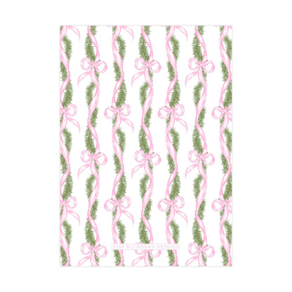 a repeating pattern of pink and green ribbons and pine branches, creating a festive and decorative design.