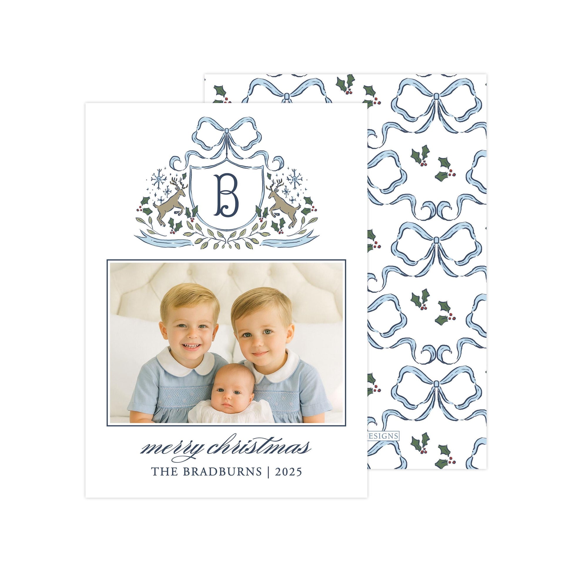 A family photo of two young boys and a baby, with a decorative border and text that reads "Merry Christmas THE BRADBURNS | 2025".