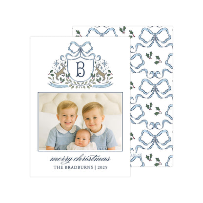 A family photo of two young boys and a baby, with a decorative border and text that reads "Merry Christmas THE BRADBURNS | 2025".
