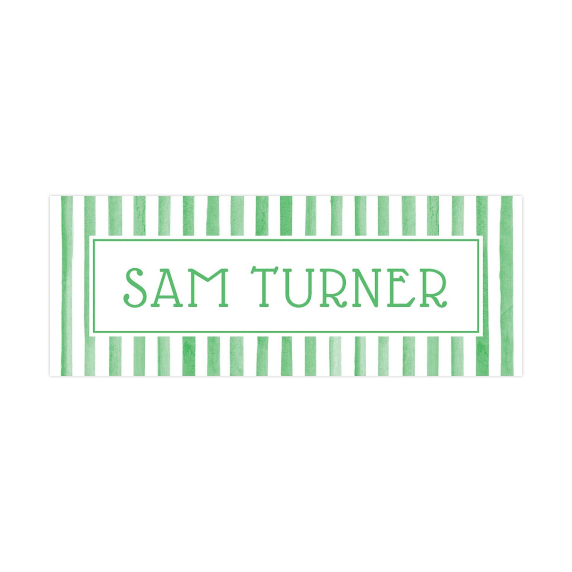A green and white striped banner with the name &quot;SAM TURNER&quot; written in a bold, capitalized font.