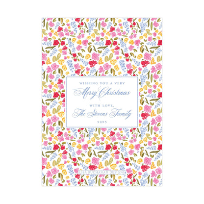 The image is a colorful greeting card with a floral pattern. The card features a message wishing someone a very Merry Christmas with love from The Stevens Family in 2020.