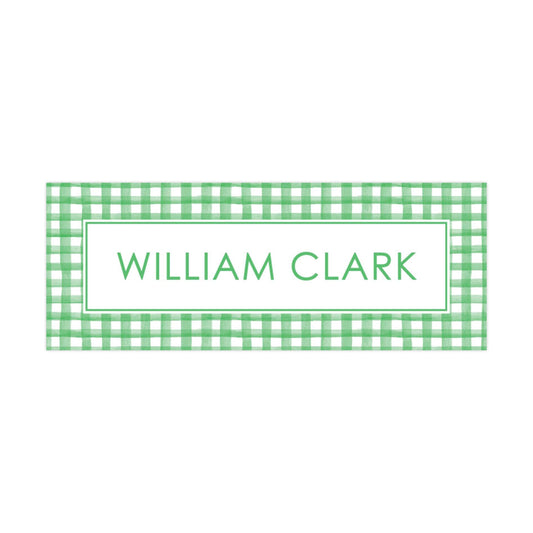 A rectangular sign with a green and white checkered border and the name &quot;William Clark&quot; written in green text.
