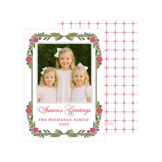 A family portrait of three young girls in white dresses, with a floral border and text that reads &quot;Season&#39;s Greetings The Buchanan Family 2015&quot;.
